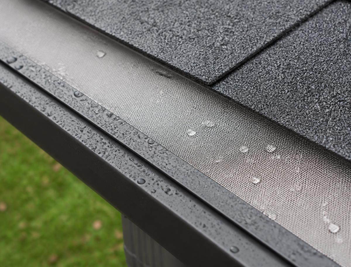 Close-up of fine micro-mesh gutter guard installed on a residential gutter